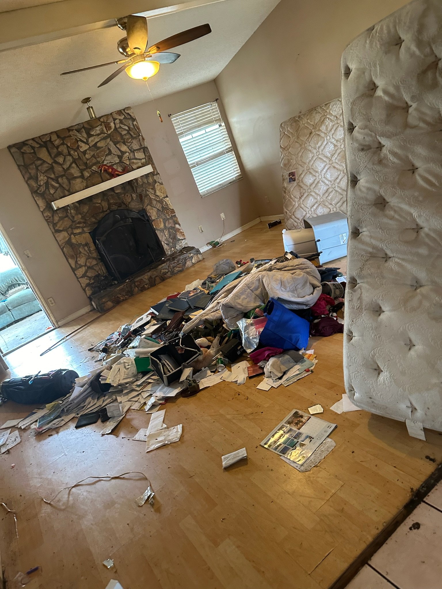 Living room before engineered wood flooring remodel in Middleburg FL